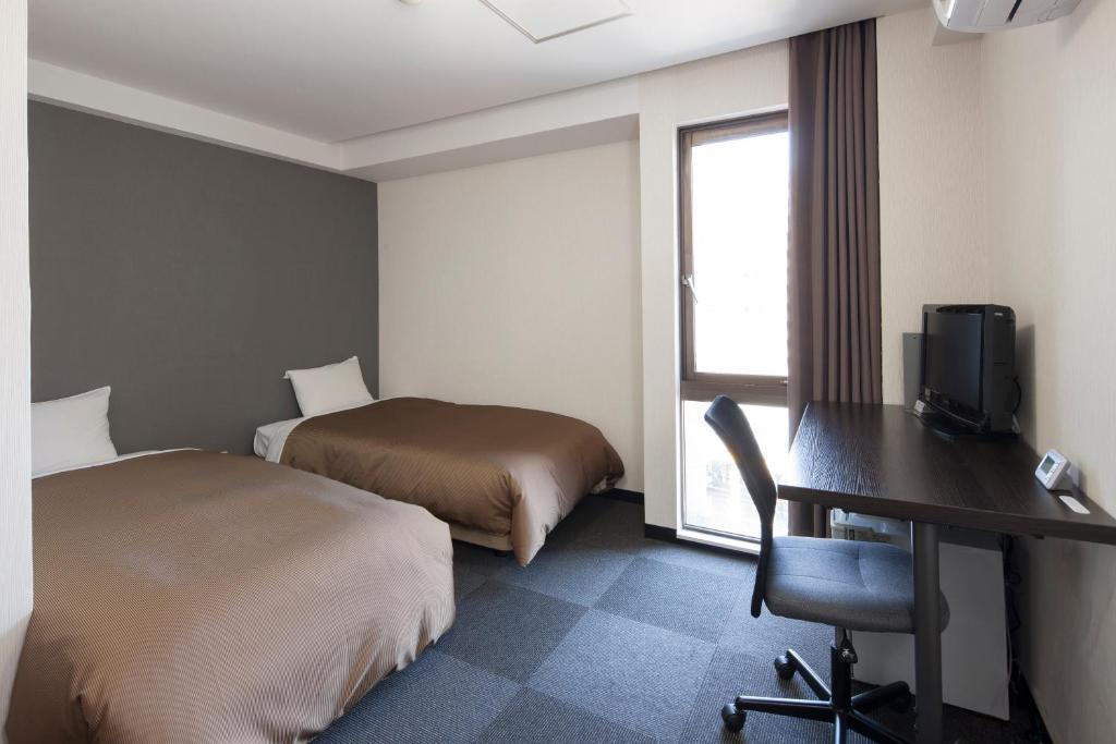Hotel Plaza Inn Tokushima Ruang foto